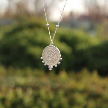 Silver lotus flower amulet necklace