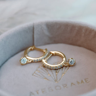 Argollas Moissanita Punto de Luz Gold - Atesorame